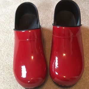 Like new red patent leather Sanita clogs.